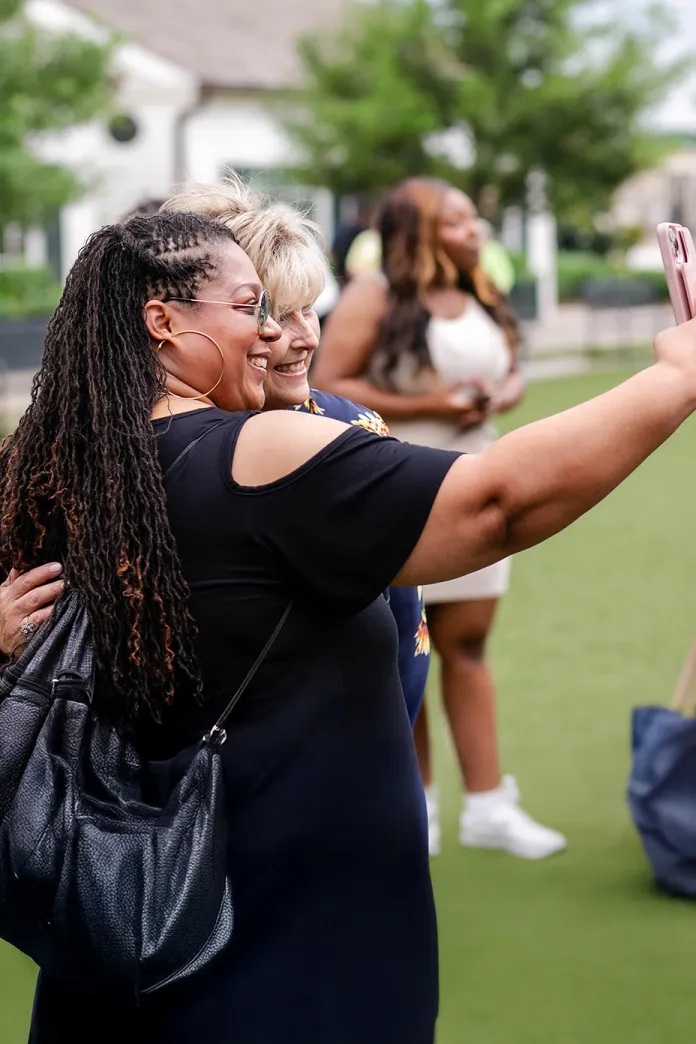 Two women smiling for a selfie